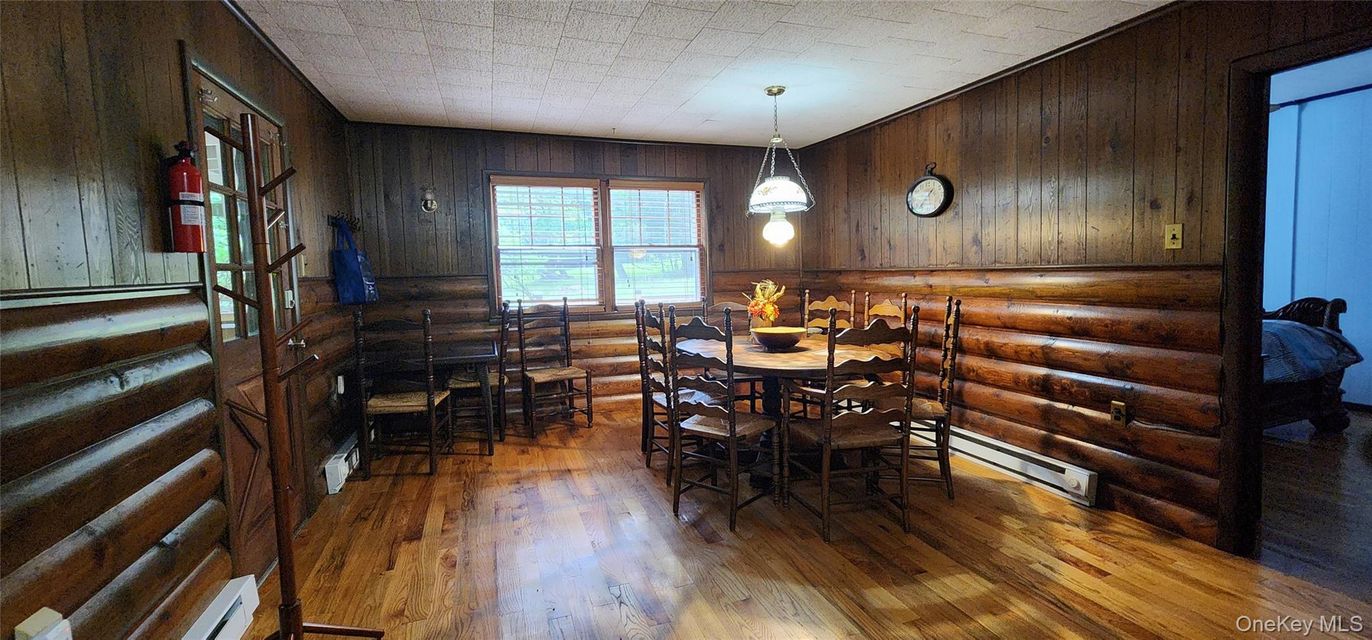 Dining room, Interior, Pendant Lights, Wood Texture Flooring, Wooden Walls