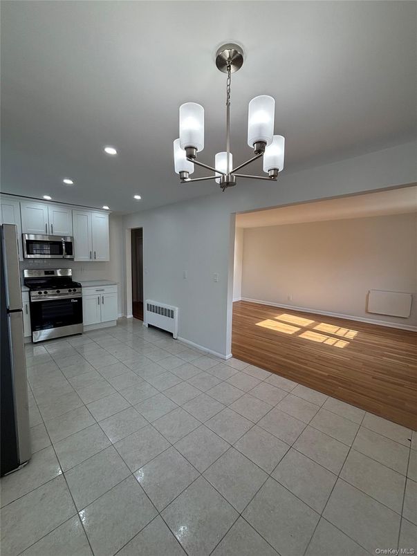 Chandelier, Interior, Kitchen, Recessed Lighting, Stainless Steel Appliances, Wood Texture Flooring