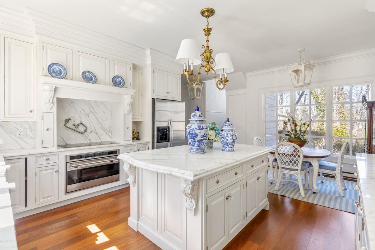Chandelier, Dining room, Interior, Kitchen, Marble Walls, Stainless Steel Appliances, Wood Texture Flooring
