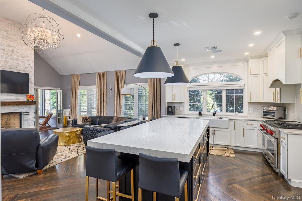 Fireplace, Interior, Kitchen, Living room, Pendant Lights, Recessed Lighting, Stainless Steel Appliances, Wood Texture Flooring