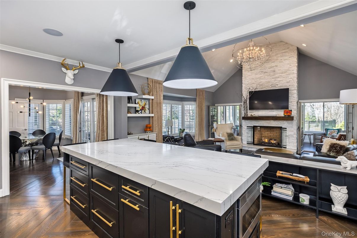 Chandelier, Dining room, Fireplace, Interior, Kitchen, Living room, Pendant Lights, Recessed Lighting, Wood Texture Flooring