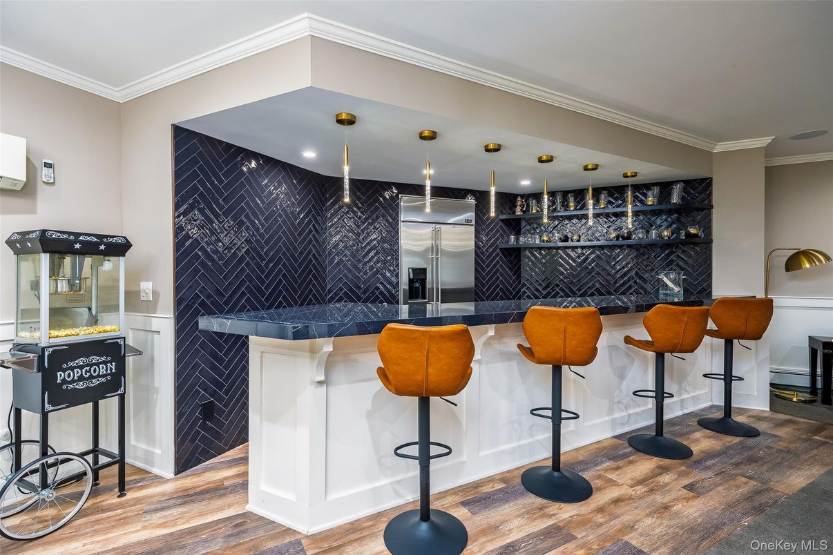 Interior, Kitchen, Marble Walls, Recessed Lighting, Stainless Steel Appliances, Wood Texture Flooring