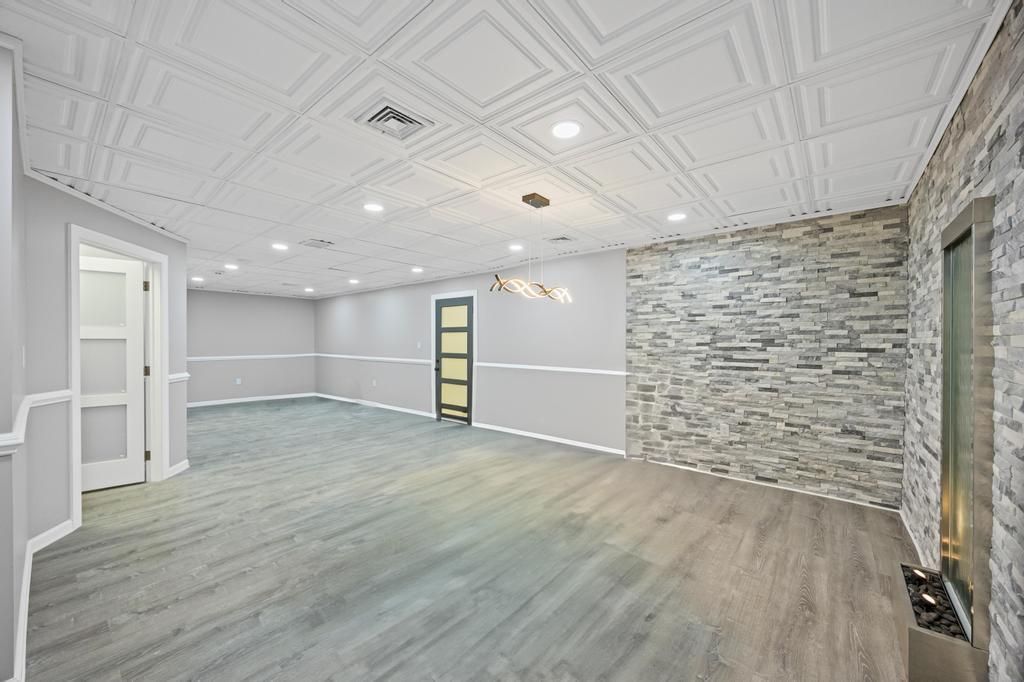 Empty room, Interior, Pendant Lights, Recessed Lighting, Stone Walls, Wood Texture Flooring
