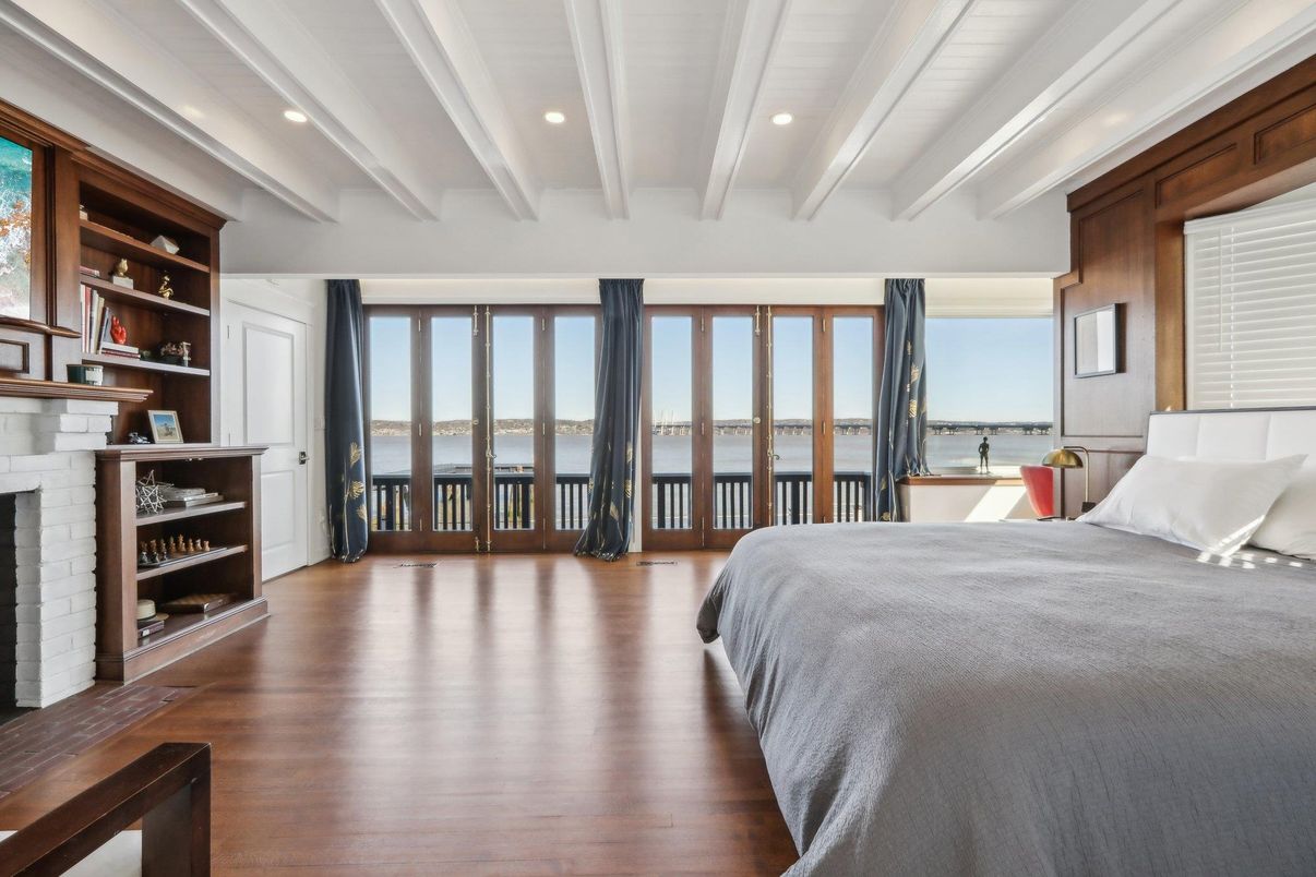 Bedroom, Fireplace, Interior, Recessed Lighting, Water, Wood Texture Flooring