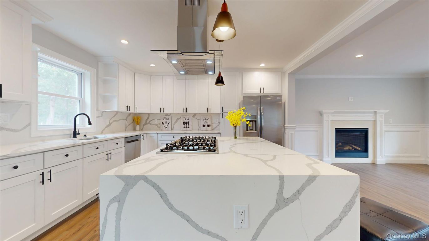 Fireplace, Interior, Kitchen, Pendant Lights, Recessed Lighting, Stainless Steel Appliances, Wood Texture Flooring