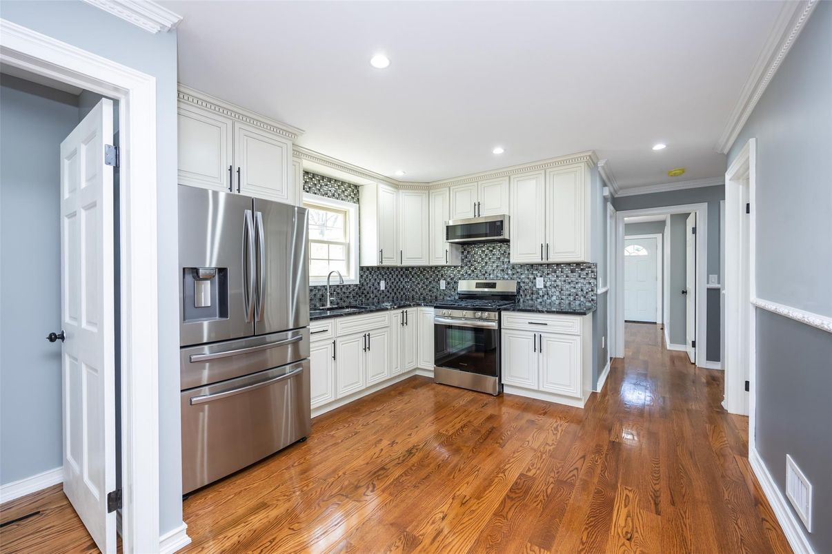 Interior, Kitchen, Recessed Lighting, Stainless Steel Appliances, Wood Texture Flooring