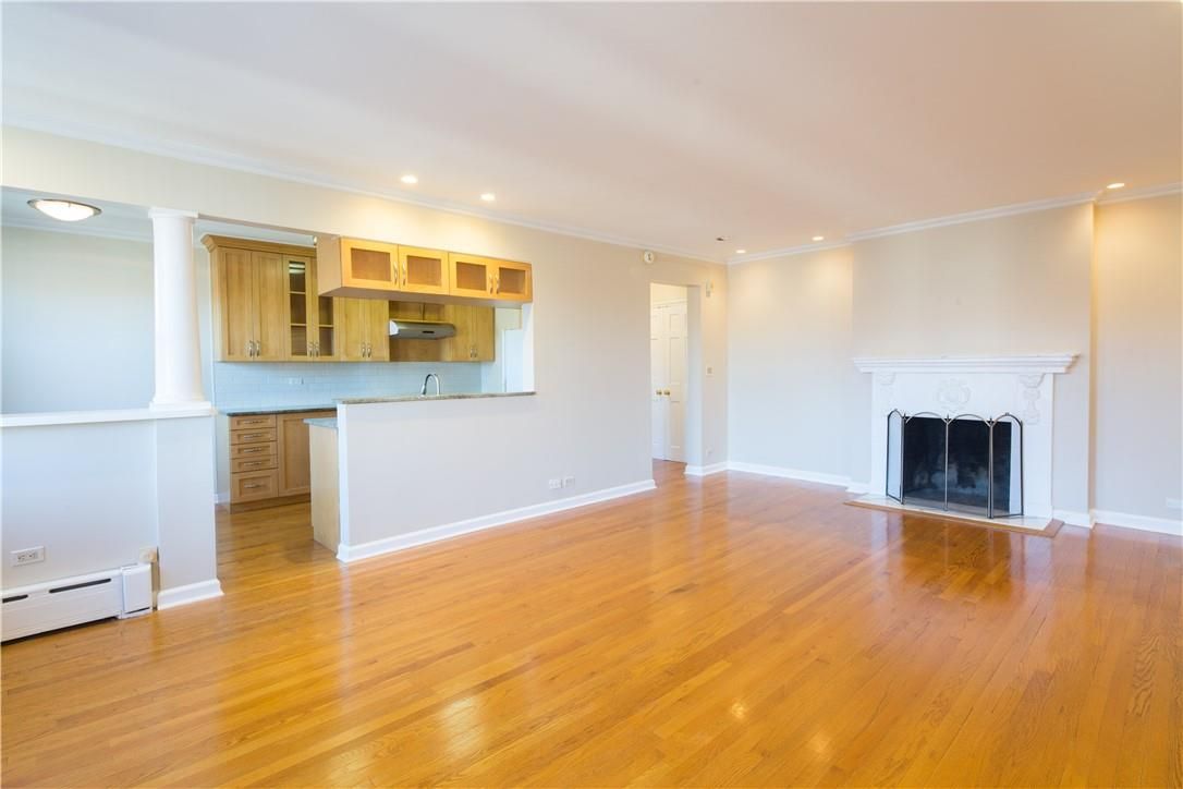 Empty room, Fireplace, Interior, Kitchen, Recessed Lighting, Wood Texture Flooring
