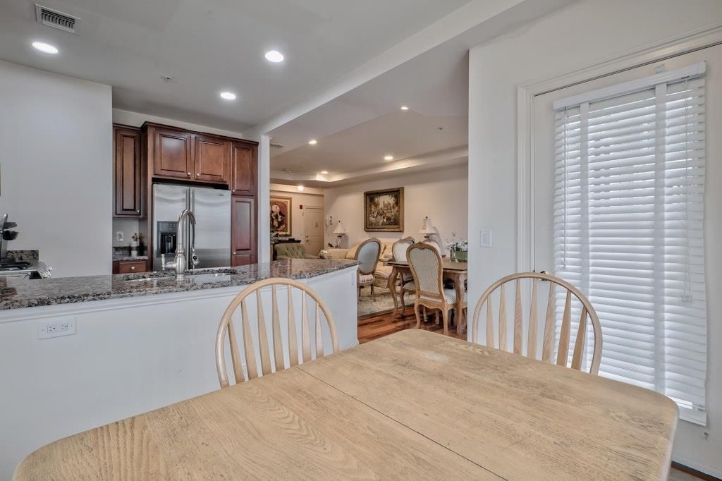 Dining room, Interior, Kitchen, Recessed Lighting, Stainless Steel Appliances, Wood Texture Flooring