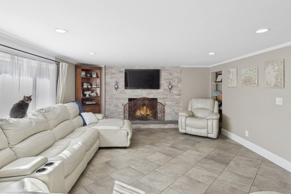 Fireplace, Interior, Living room, Recessed Lighting, Stone Walls