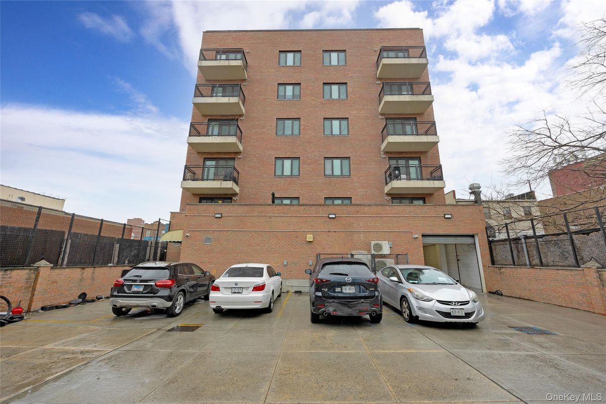 Exterior, Facade, Brick Facade, Condo Building