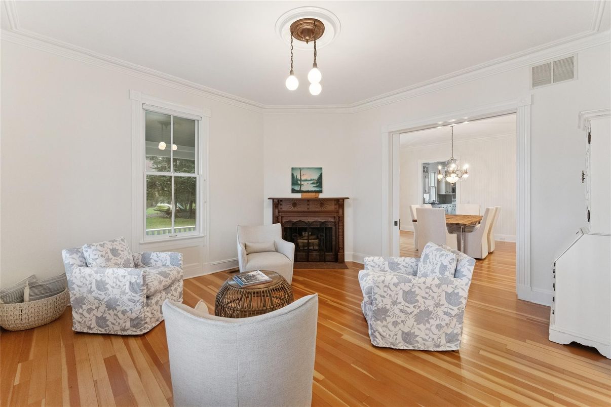 Chandelier, Dining room, Fireplace, Interior, Living room, Pendant Lights, Wood Texture Flooring