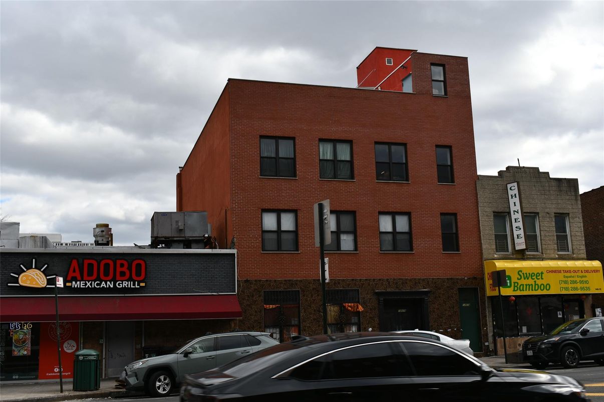 Exterior, Facade, Brick Facade, Condo Building
