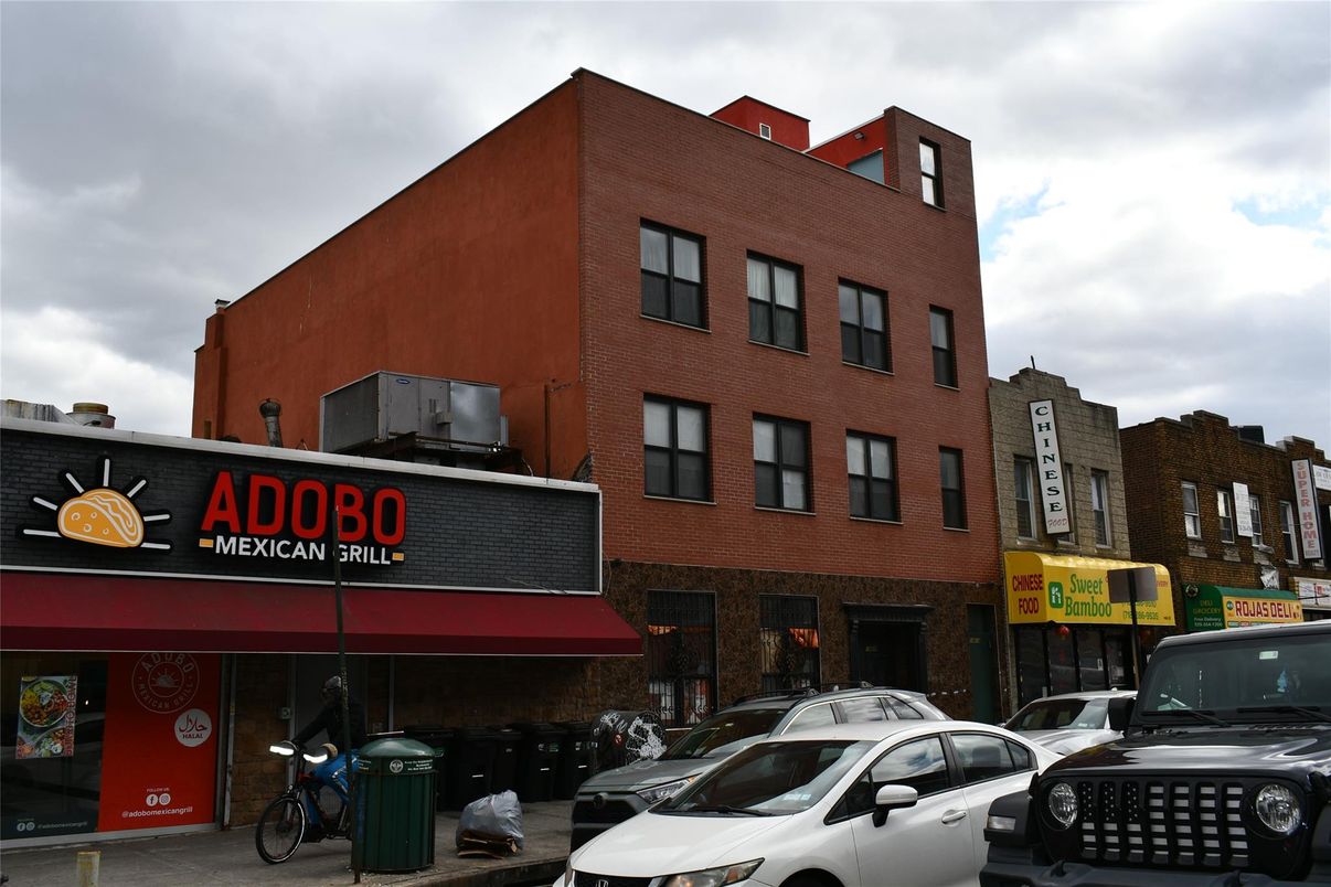 Exterior, Facade, Brick Facade, Condo Building