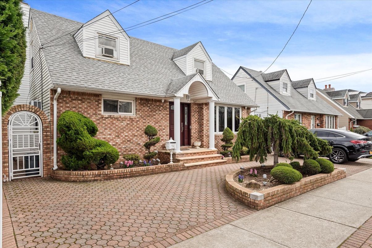 Exterior, Facade, Brick Facade, Cape Cod