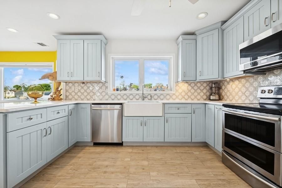 Interior, Kitchen, Recessed Lighting, Stainless Steel Appliances, Wood Texture Flooring