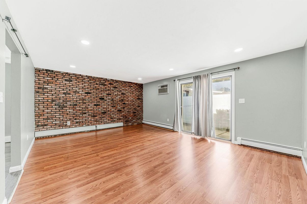 Empty room, Interior, Recessed Lighting, Stone Walls, Wood Texture Flooring