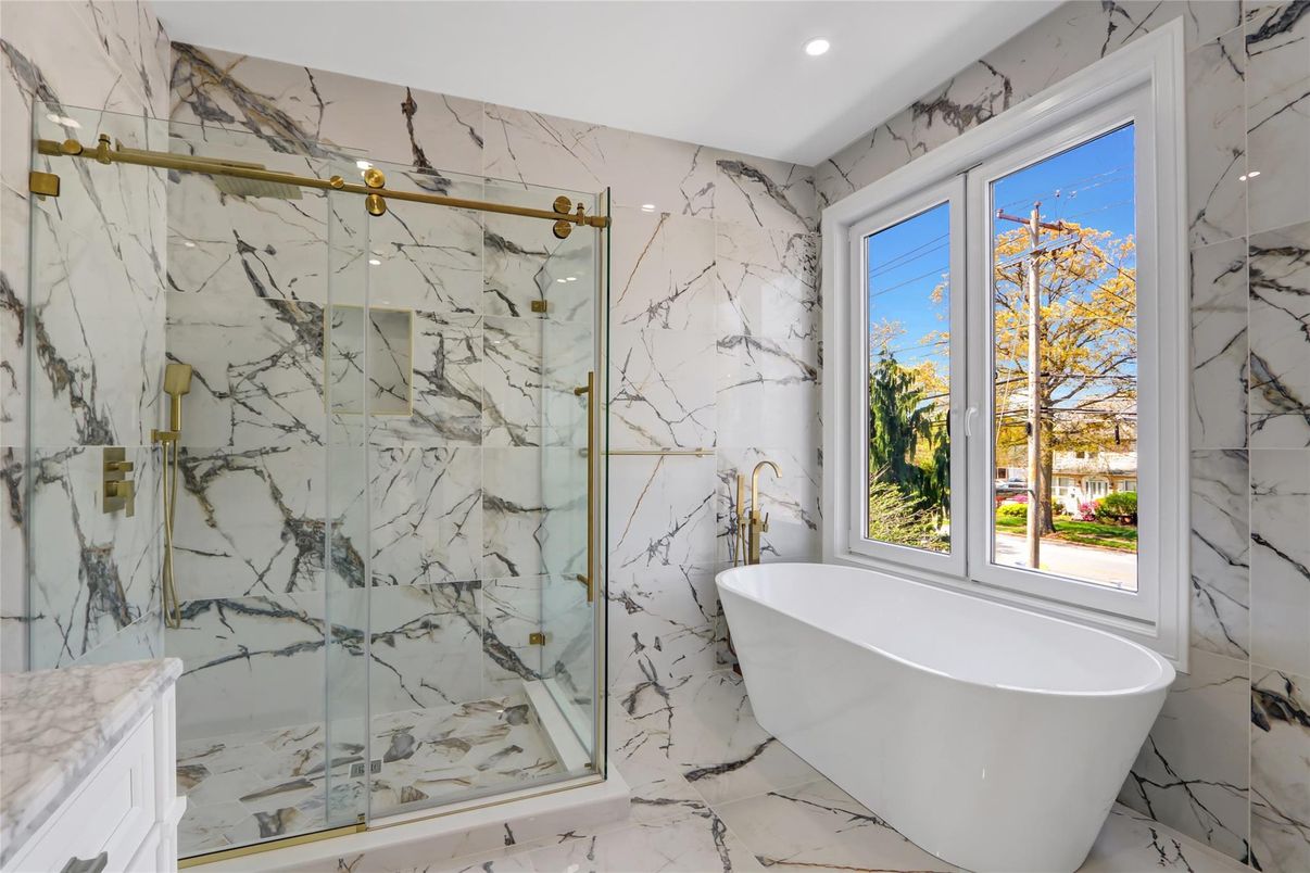 Bathroom, Free Standing Baths, Glass Shower, Interior, Marble, Marble Walls, Recessed Lighting