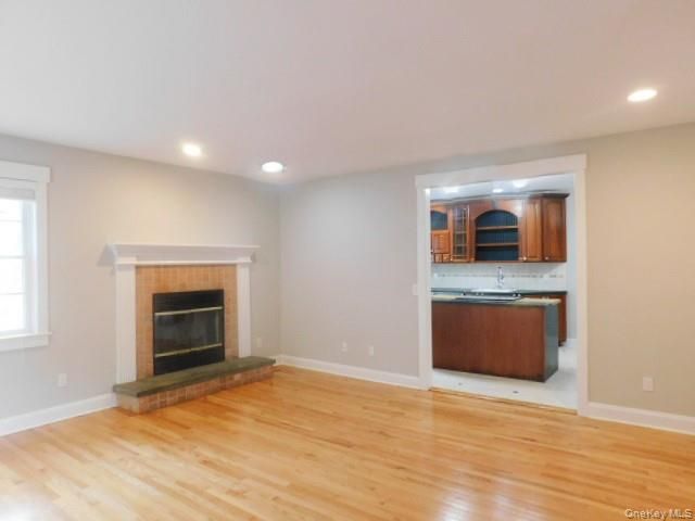 Empty room, Fireplace, Interior, Recessed Lighting, Wood Texture Flooring