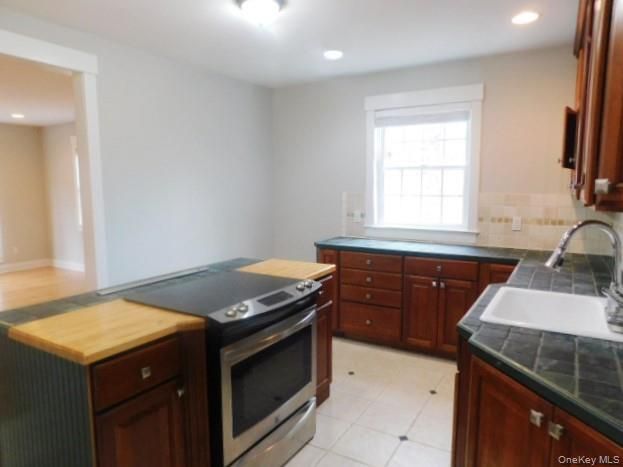 Interior, Kitchen, Recessed Lighting, Tile Countertops