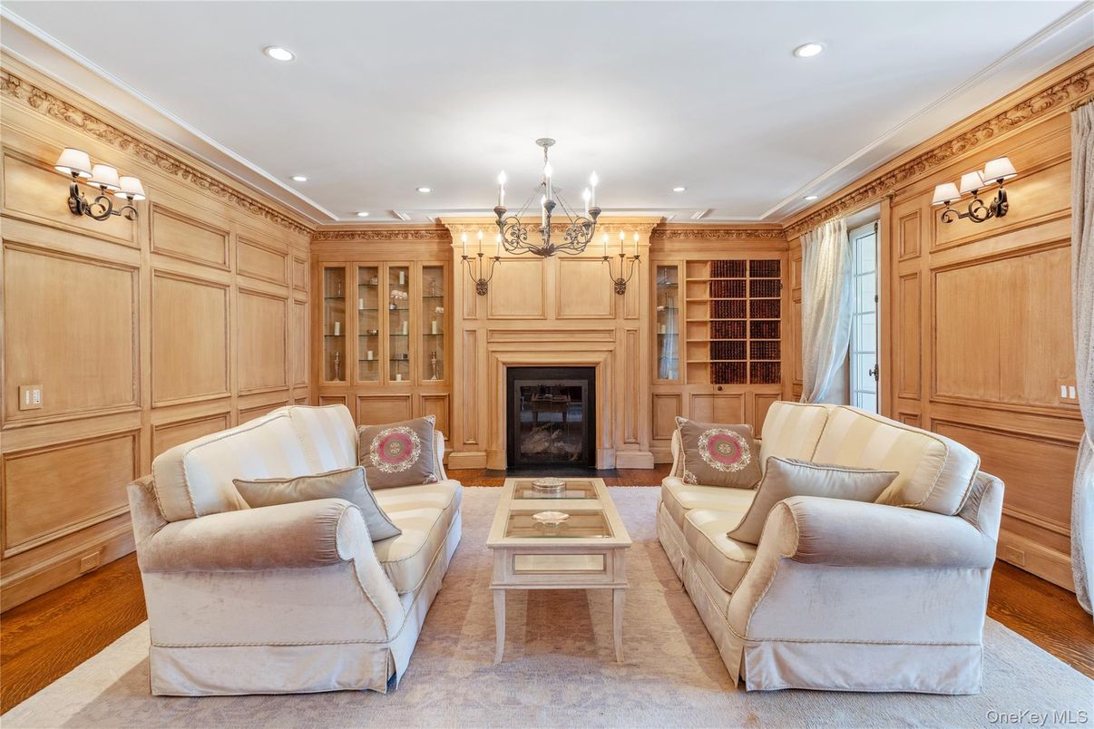 Chandelier, Fireplace, Interior, Living room, Recessed Lighting, Wood Texture Flooring, Wooden Walls