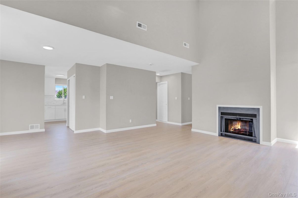 Empty room, Fireplace, Interior, Recessed Lighting, Wood Texture Flooring