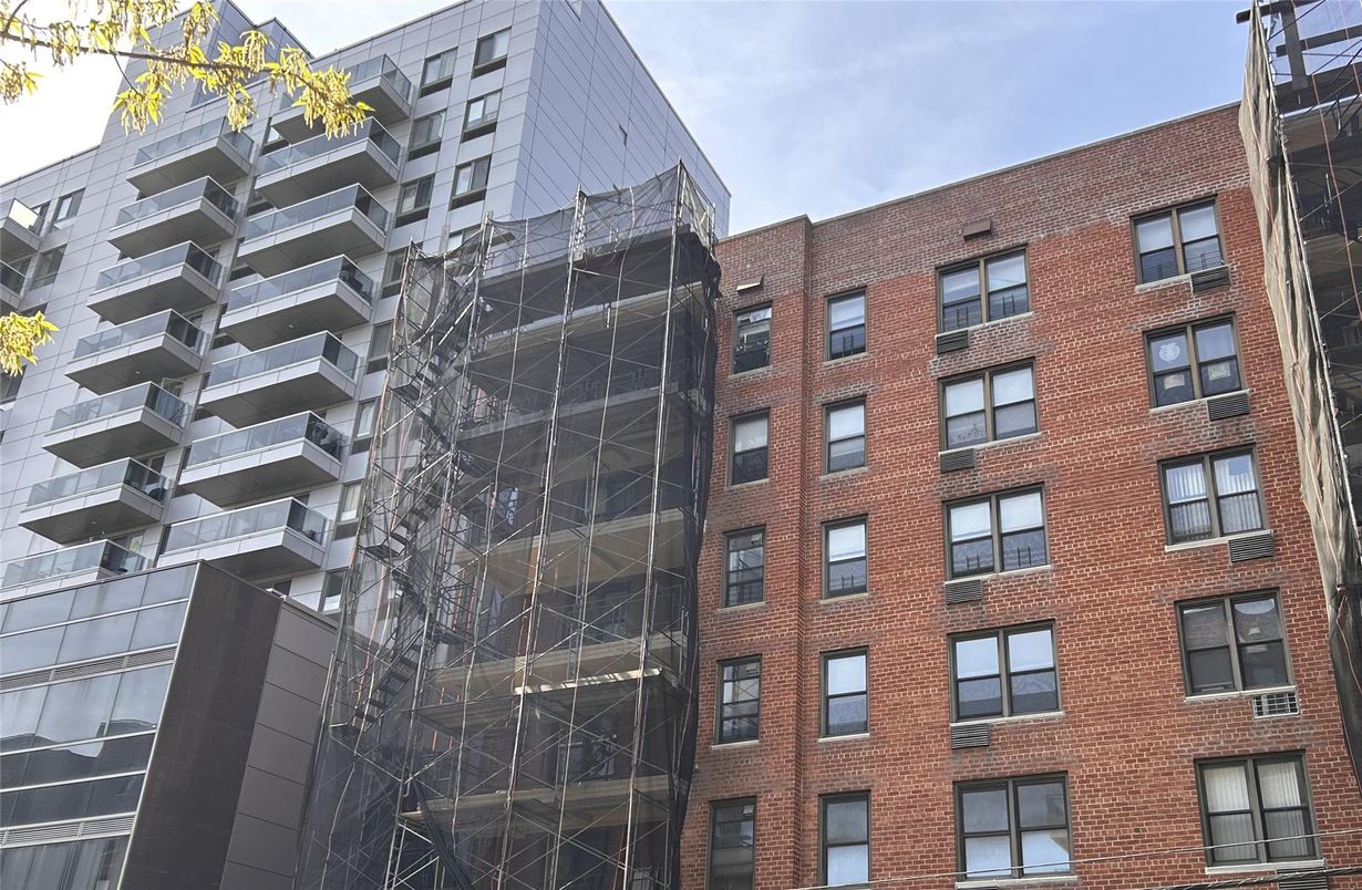 Exterior, Facade, Brick Facade, Condo Building