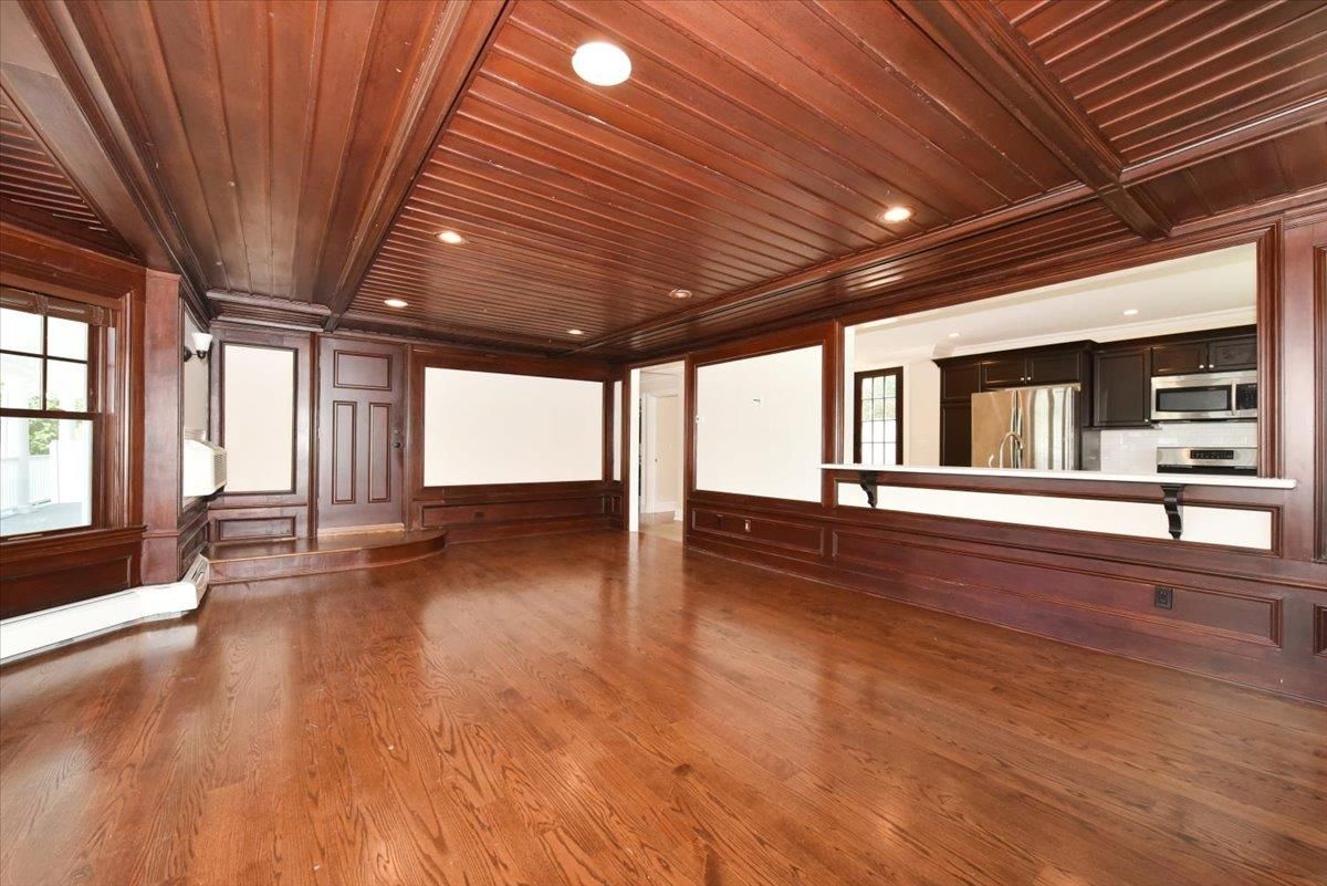 Empty room, Interior, Kitchen, Recessed Lighting, Stainless Steel Appliances, Wooden Ceilings, Wood Texture Flooring