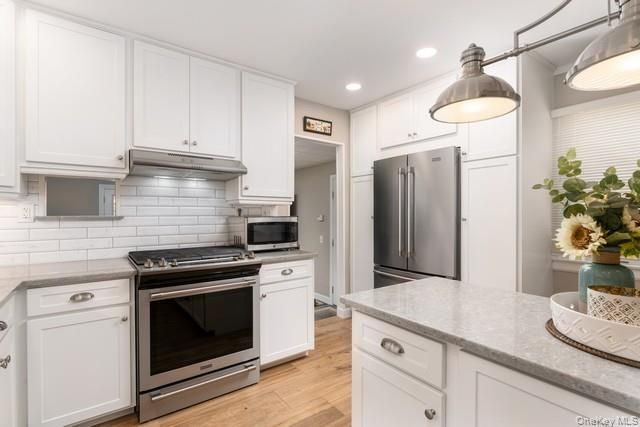 Interior, Kitchen, Pendant Lights, Recessed Lighting, Stainless Steel Appliances, Wood Texture Flooring
