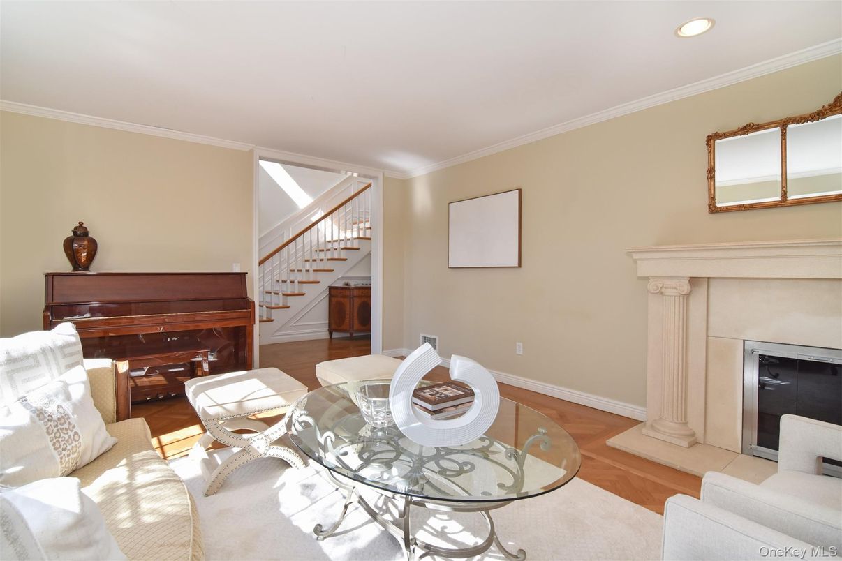 Fireplace, Interior, Living room, Piano, Recessed Lighting, Wood Texture Flooring