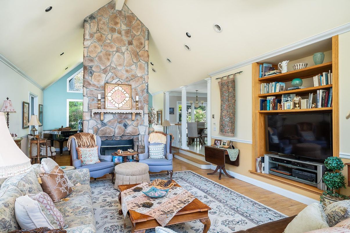 Fireplace, Interior, Living room, Recessed Lighting, Stone Walls, Wood Texture Flooring