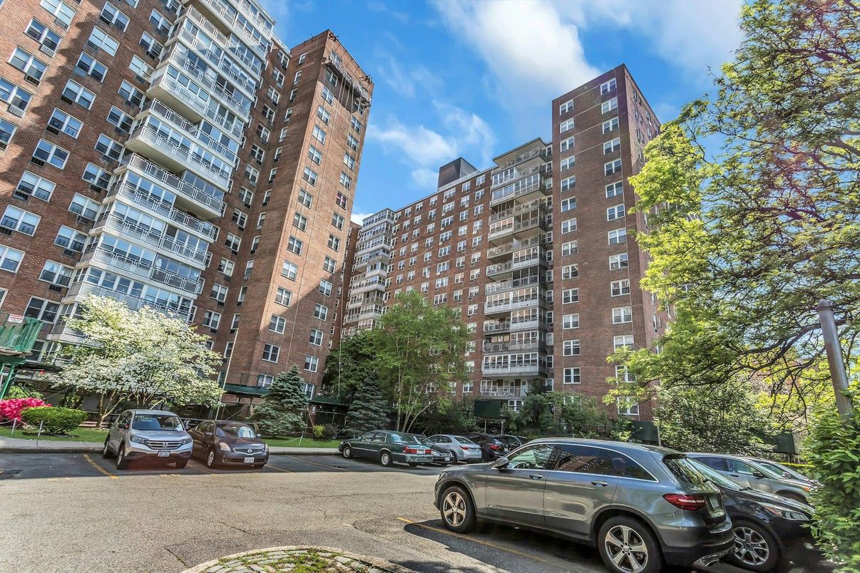 Exterior, Facade, Brick Facade, Condo Building