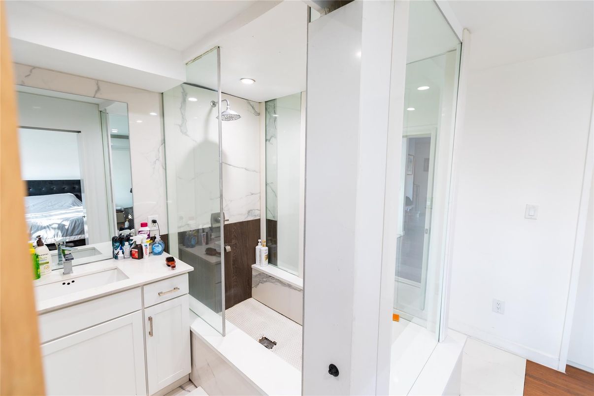 Bathroom, Glass Shower, Interior, Marble Walls, Recessed Lighting, Wood Texture Flooring