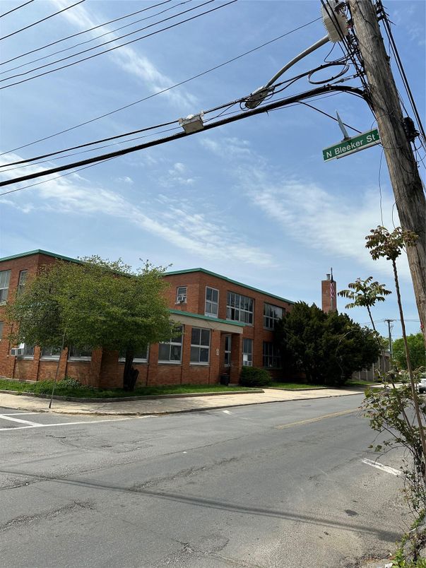 Exterior, Facade, Brick Facade, Condo Building