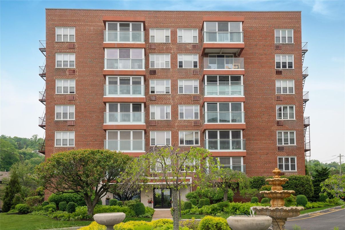 Exterior, Facade, Brick Facade, Condo Building