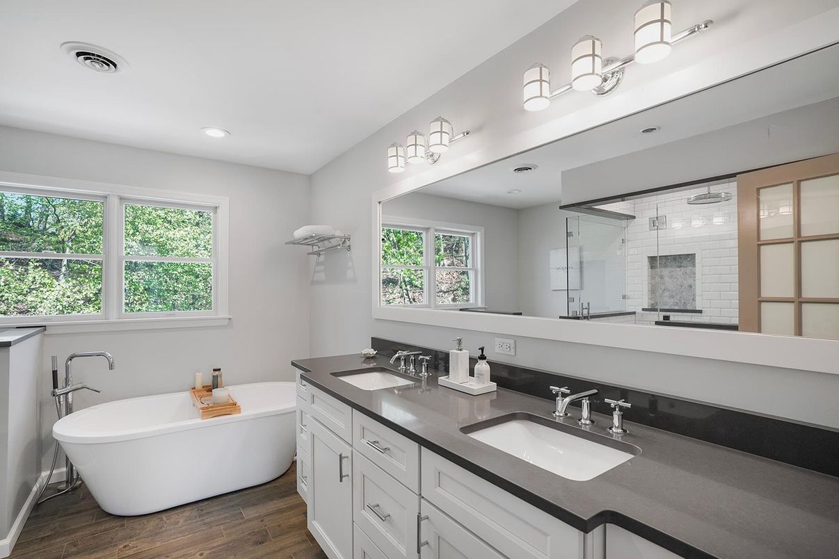 Bathroom, Dual Sink Vanities, Free Standing Baths, Glass Shower, Interior, Recessed Lighting, Wood Texture Flooring