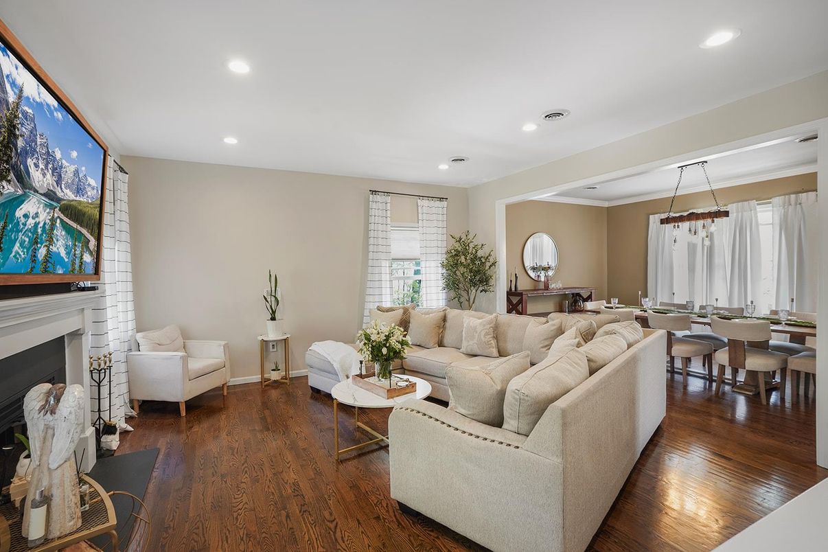 Dining room, Fireplace, Interior, Living room, Pendant Lights, Recessed Lighting, Wood Texture Flooring