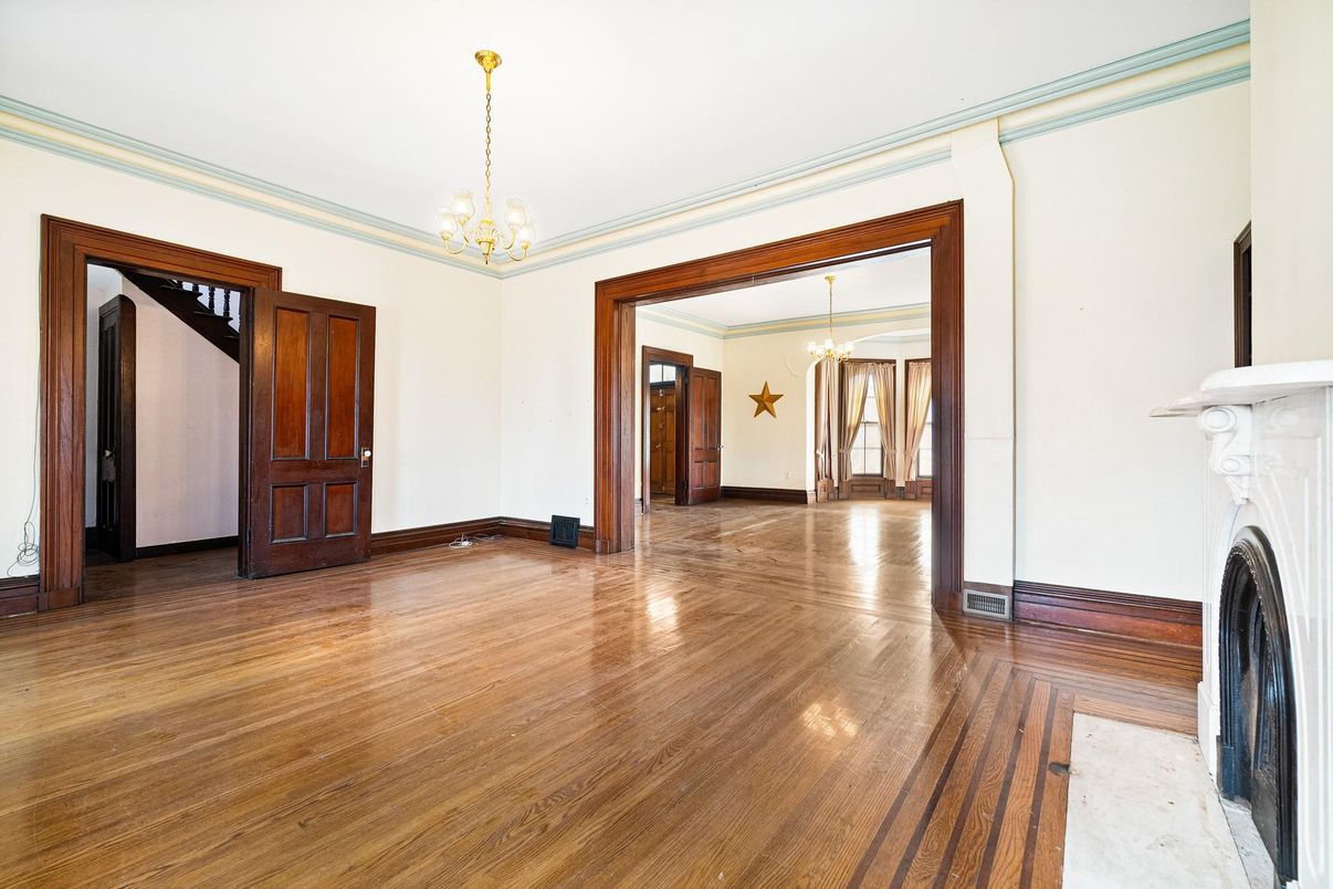 Chandelier, Empty room, Fireplace, Interior, Wood Texture Flooring
