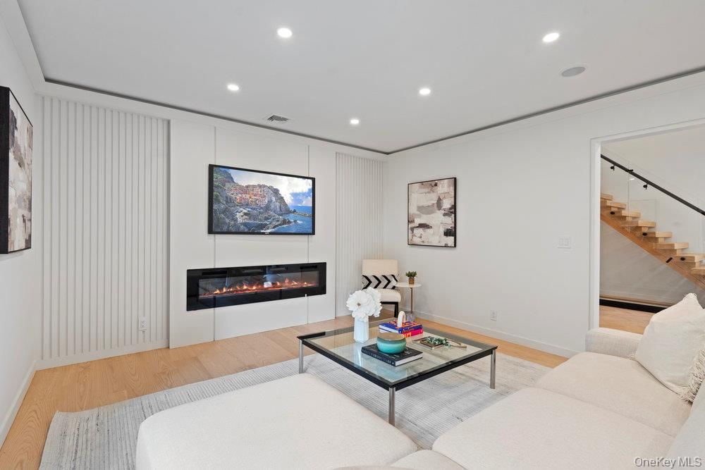 Fireplace, Interior, Living room, Recessed Lighting, Wood Texture Flooring