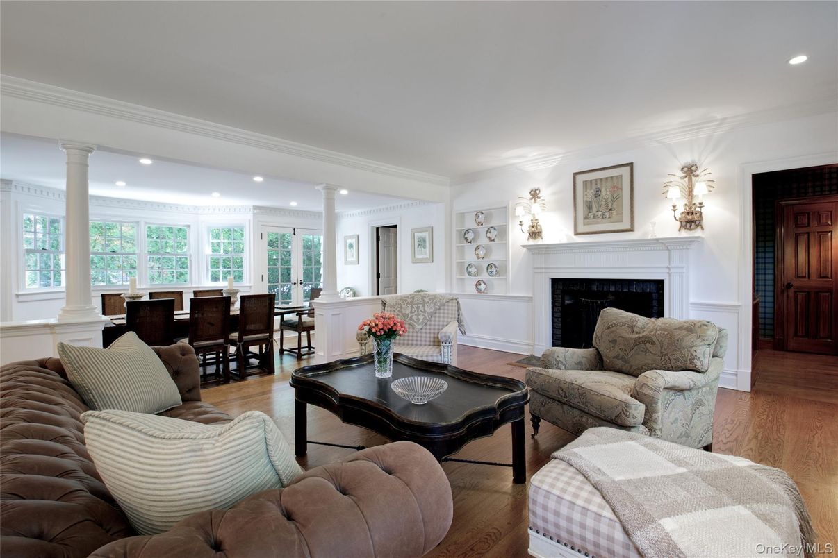 Dining room, Fireplace, Interior, Living room, Recessed Lighting, Wood Texture Flooring