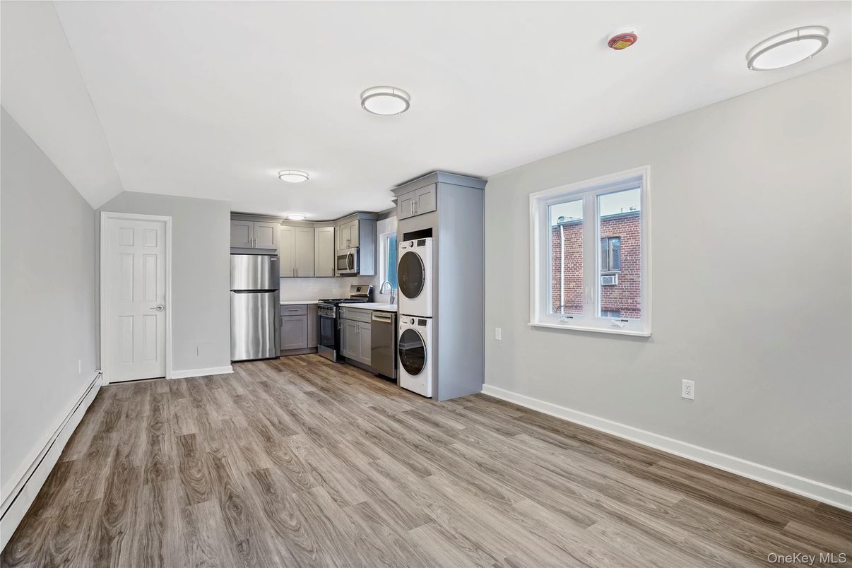 Interior, Kitchen, Recessed Lighting, Stainless Steel Appliances, Washer, Wood Texture Flooring