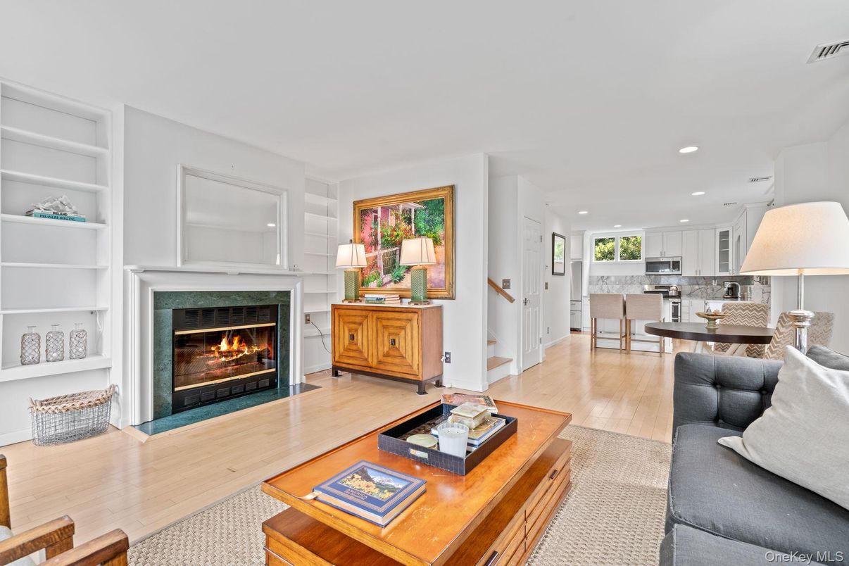 Dining room, Fireplace, Interior, Kitchen, Living room, Recessed Lighting, Wood Texture Flooring