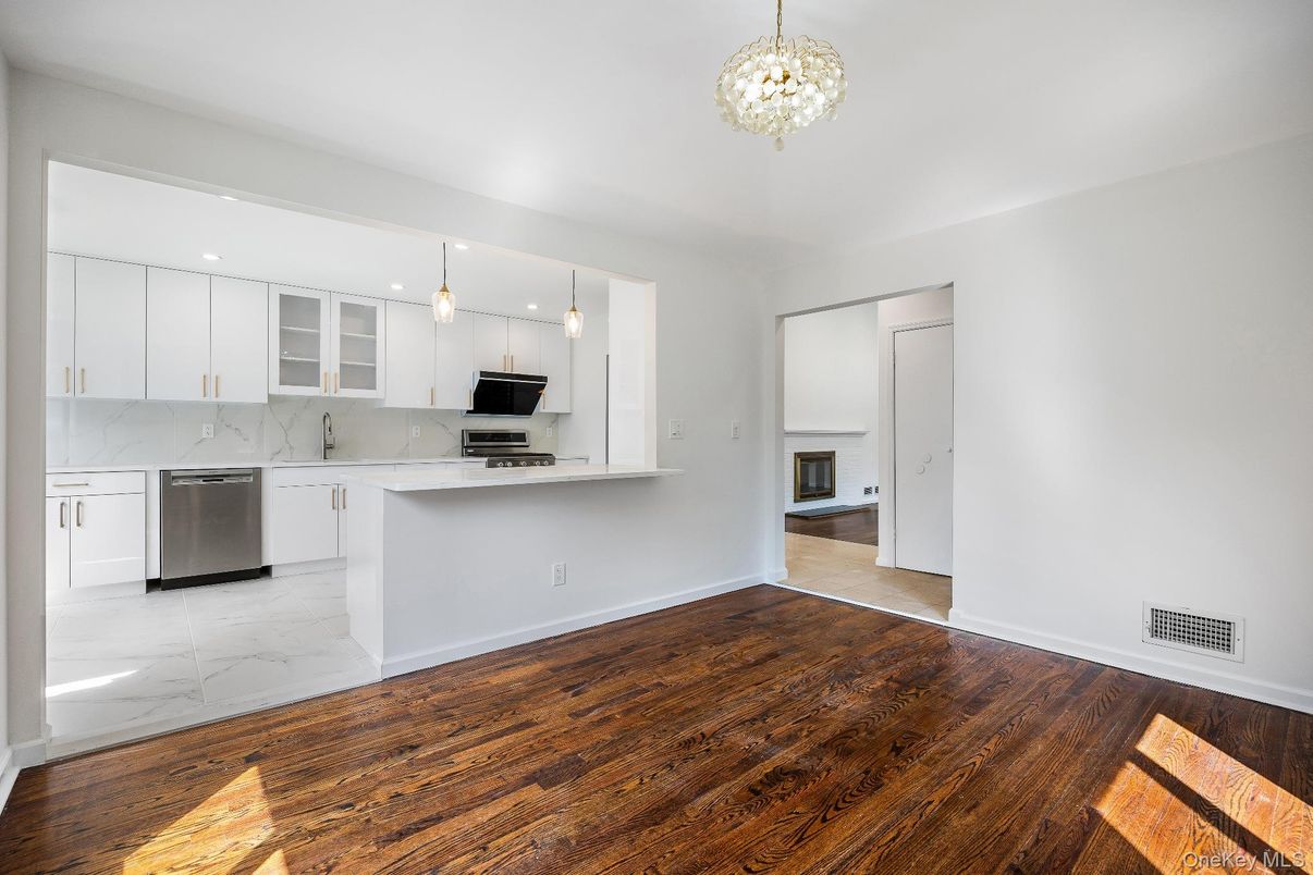 Interior, Kitchen, Marble, Pendant Lights, Recessed Lighting, Stainless Steel Appliances, Wood Texture Flooring