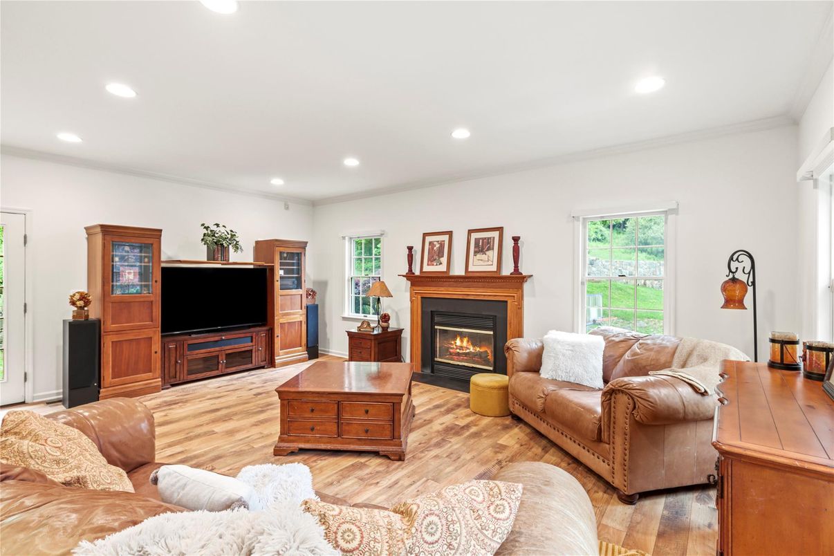 Fireplace, Interior, Living room, Recessed Lighting, Wood Texture Flooring