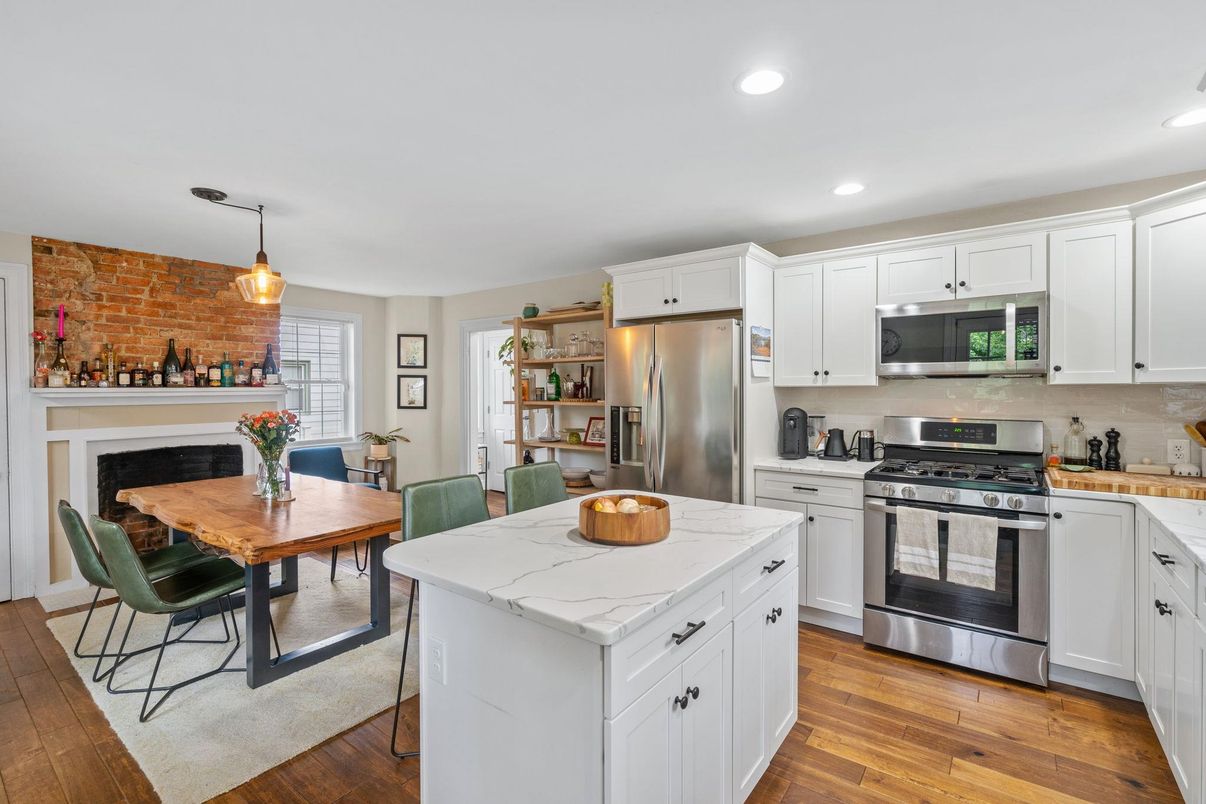 Dining room, Interior, Kitchen, Pendant Lights, Recessed Lighting, Stainless Steel Appliances, Stone Walls, Wood Texture Flooring