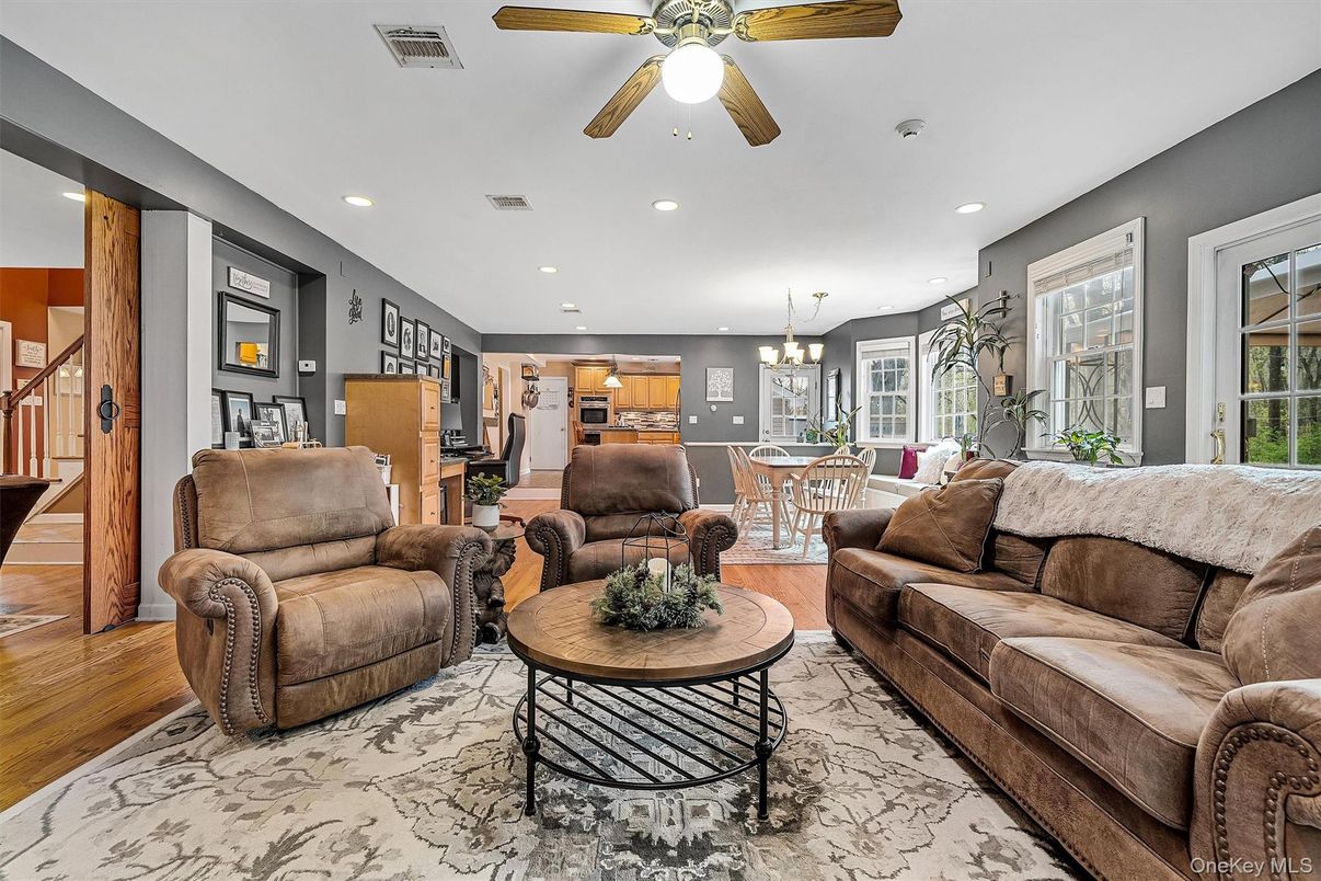 Chandelier, Dining room, Interior, Kitchen, Living room, Recessed Lighting, Stainless Steel Appliances, Wood Texture Flooring