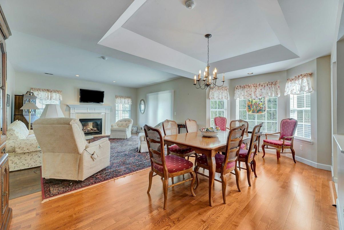 Chandelier, Dining room, Fireplace, Interior, Living room, Recessed Lighting, Wood Texture Flooring