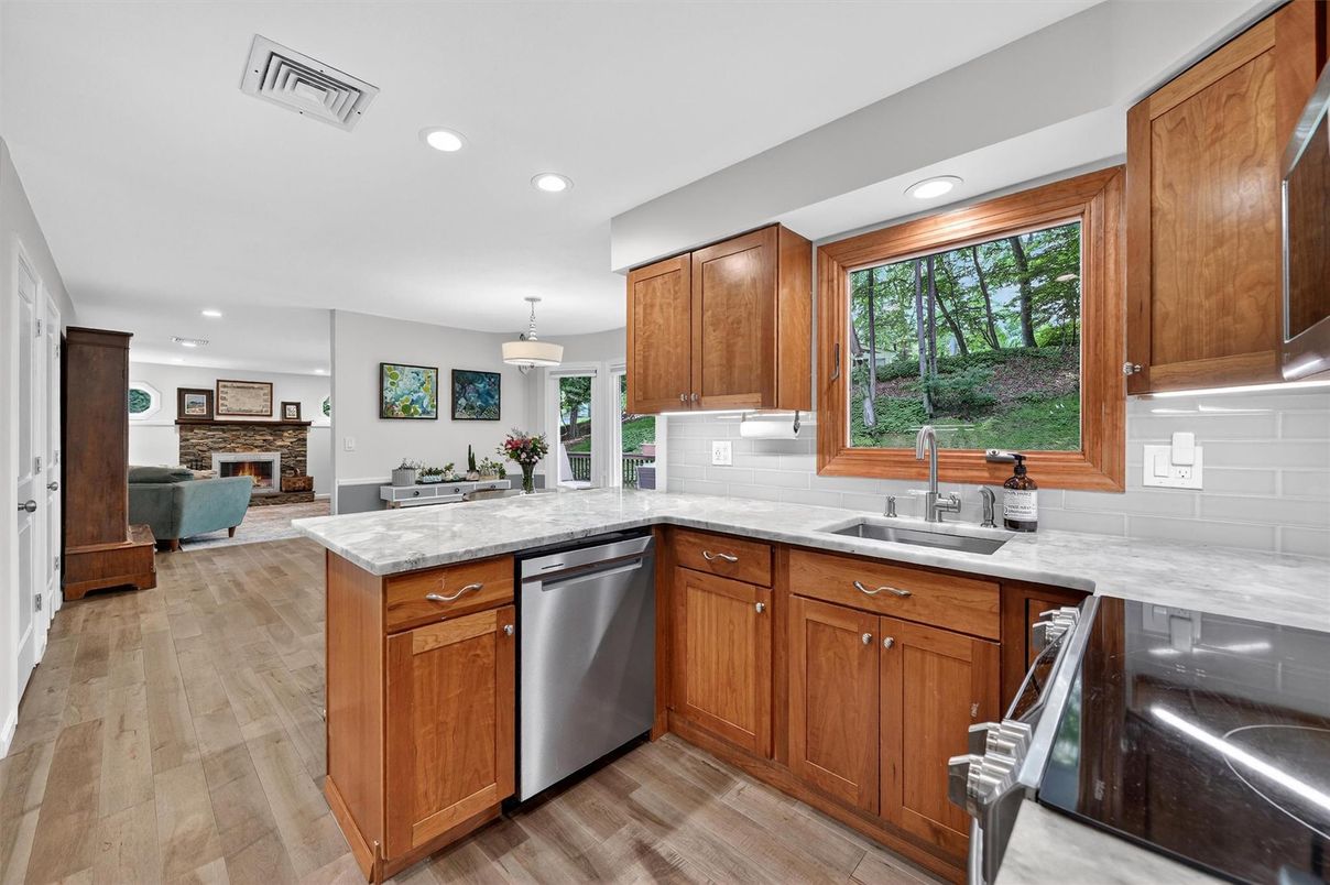 Fireplace, Interior, Kitchen, Pendant Lights, Recessed Lighting, Wood Texture Flooring