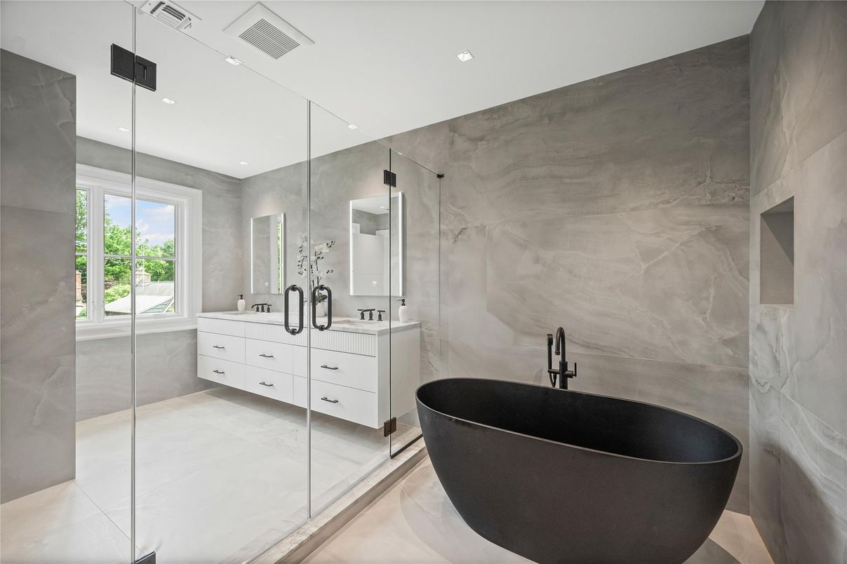 Bathroom, Dual Sink Vanities, Free Standing Baths, Glass Shower, Interior, Marble Walls, Recessed Lighting