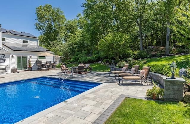 Exterior, Pool, Solar Panels