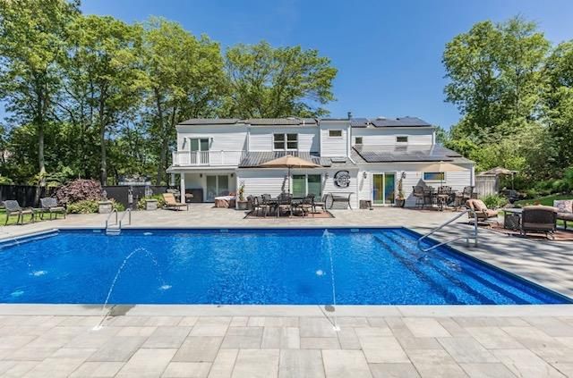 Exterior, Pool, Solar Panels